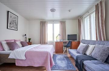 Фото номера Четырехместный номер с собственной ванной комнатой Мини-отель Hotel Villa Molnby г. Порвоо 5
