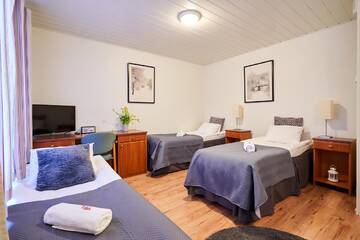 Фото номера Трехместный номер с собственной ванной комнатой Гостевой дом Guest House Porvoo г. Порвоо 2
