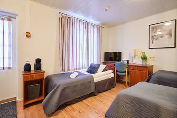 Фото номера Трехместный номер с собственной ванной комнатой Гостевой дом Guest House Porvoo г. Порвоо 4
