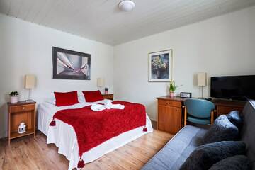 Фото номера Четырехместный номер с собственной ванной комнатой Гостевой дом Guest House Porvoo г. Порвоо 2