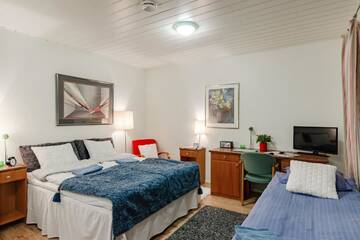 Фото номера Трехместный номер с собственной ванной комнатой Гостевой дом Guest House Porvoo г. Порвоо 7